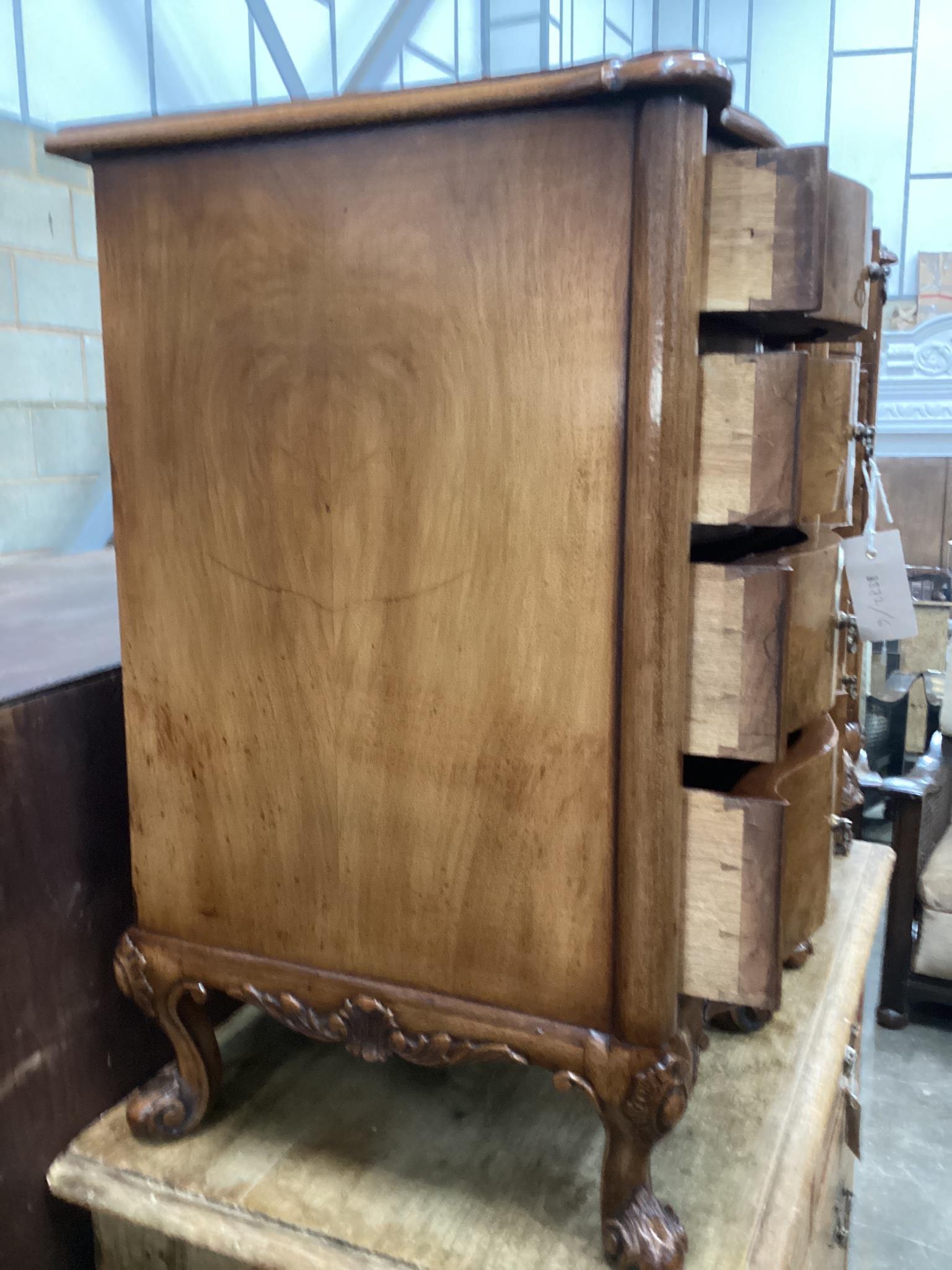 A pair of Queen Anne revival walnut serpentine four drawer bedside chests, width 38cm, depth 43cm, height 70cm